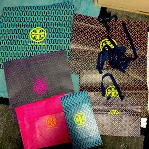 Assorted Tory Burch gift and shoes bags. There are 11 bags total